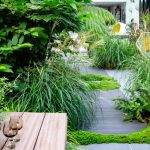 Lush Plantings Surround Cozy Seating Areas
