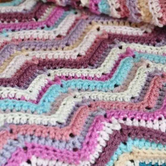 close-up photo of ripple crochet blanket