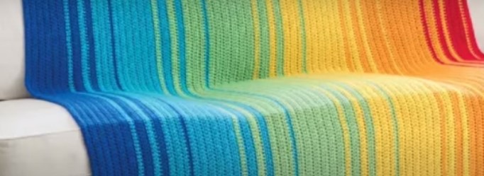 temperature crochet blanket lain on a couch