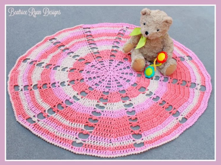 sugar wheel easy crochet baby blanket with teddy bear and baby toy